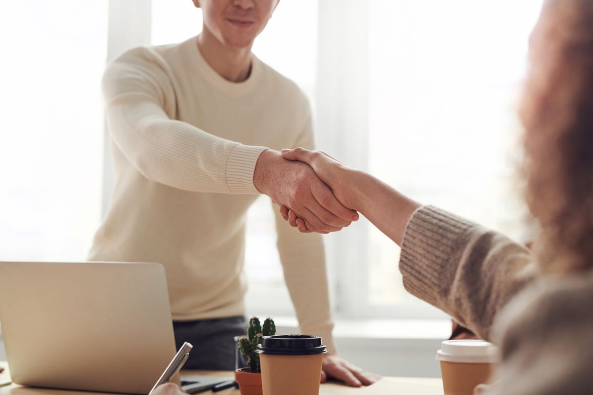 Professionals collaborating on workforce programs