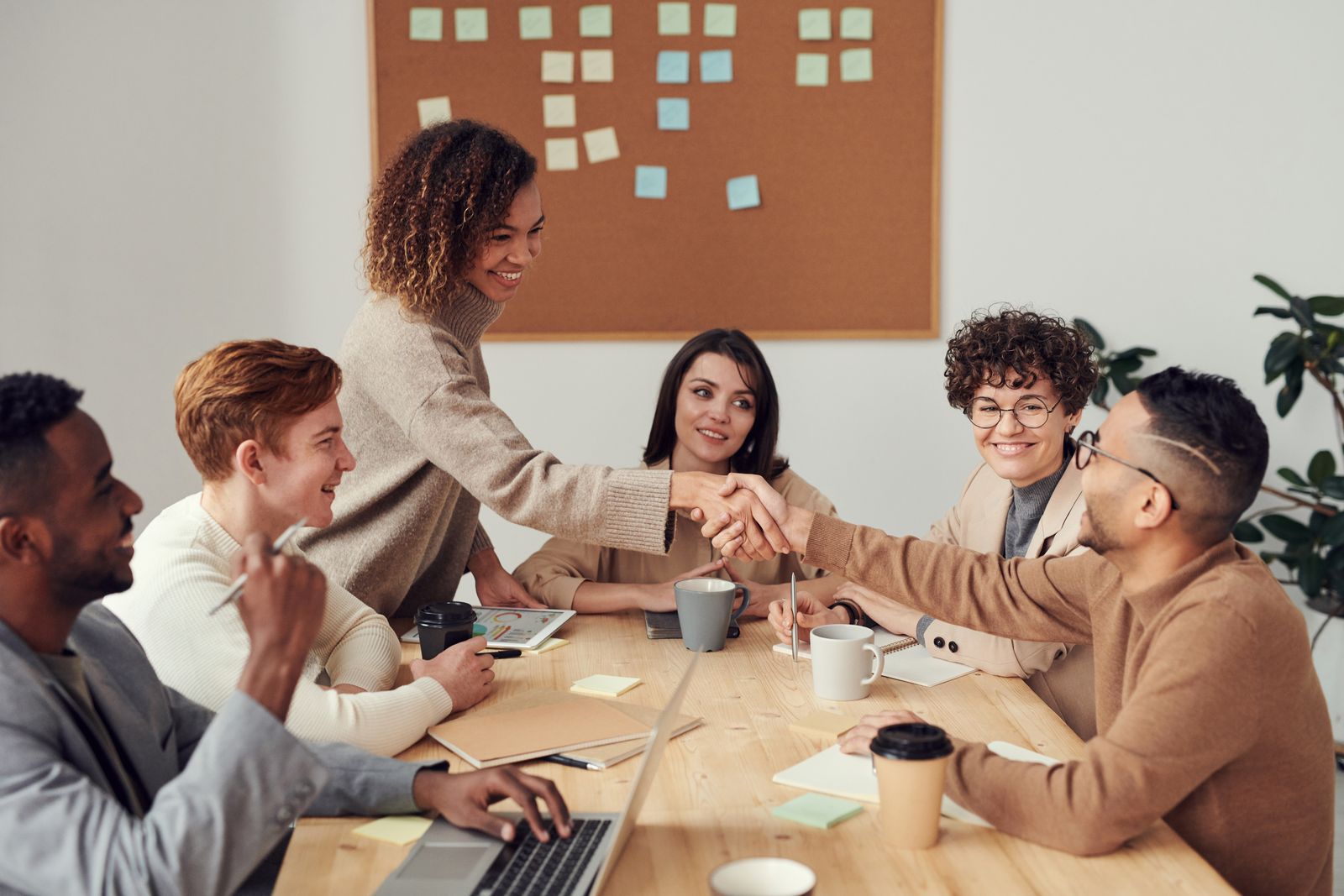 Professionals reviewing workforce data together